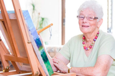 An Elderly Woman Painting - Home Care For Elderly - ESP Healthcare