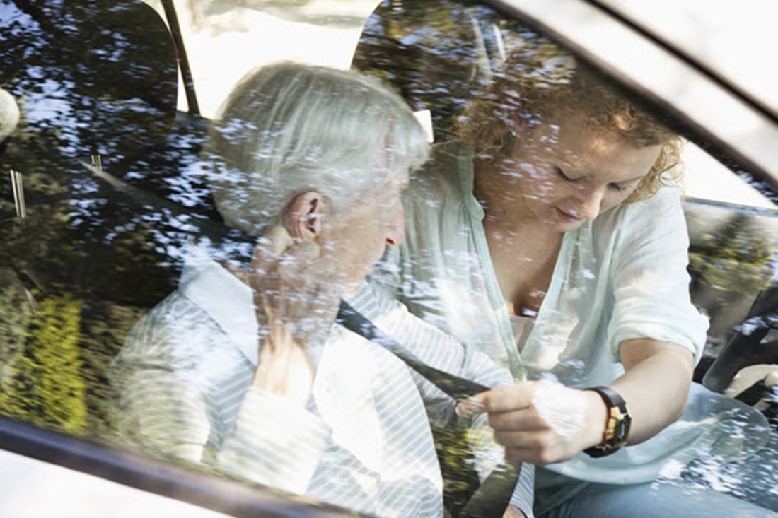 Senior Woman Getting Help with Fastening Her Seat belt In The Car - Sydney Home Care - ESP Healthcare