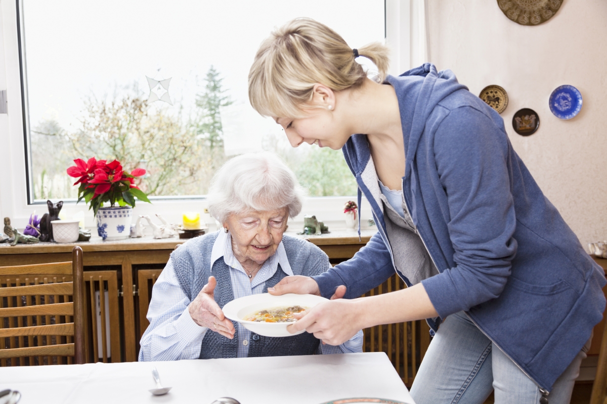 A Young Woman Prepares An Old Woman's Meal -In  Home Care Sydney - ESP Healthcare