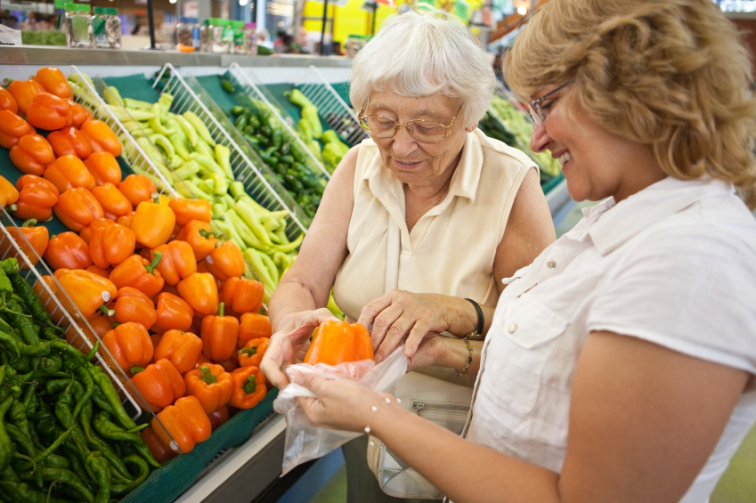 A Woman Helping Elderly Lady With Grocery Shopping - In Home Help For The Elderly - ESP Healthcare