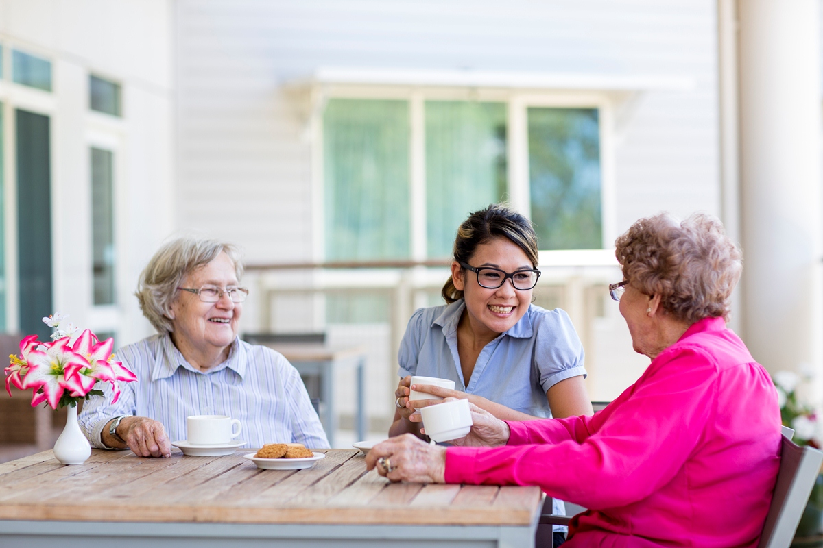 A Young Woman Enjoys Talking To two Older Women - Home Care Sydney - ESP Healthcare